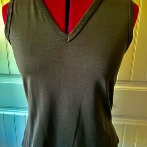 Black V-neck polyester tank top.